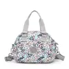 Comercio Exterior al por Mayor Otoño Nuevo Bolso de Tela de Nylon Estampado para Mujer Estilo Coreano Ligero Bolso de Hombro Casual Portátil Bolso Cruzado