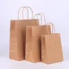 Sacola de compras de papel kraft spot logo personalizado lisa portátil para levar embalagem de restaurante sacola personalizada universal