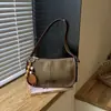Bolsa Transversal Simples da Moda para o Dia a Dia Feminina 2026 Nova Casual Personalidade Diária Bolsa de Ombro Alto Valor Tendência Bolsa Bolinho