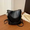 Bolsa transversal retrô estilo Hong Kong 2026 nova bolsa de ombro da moda bolsa de balde texturizada bolsa transversal simples para o dia a dia feminina