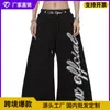 Calça de moletom com bainha curva, bloqueio de cores, estampa de letras, estilo falso duas peças, estilo americano, para comércio exterior transfronteiriço, para homens e mulheres, perna larga solta para dança de jazz