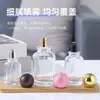 Botella de perfume de vidrio transparente en stock, venta directa, con tapa de bola, botella vacía rellenable de prensa-spray cosmético portátil