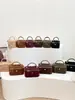 Bolso pequeño cuadrado cruzado de un solo hombro con patrón de diamantes 2026 transfronterizo, bolso tipo caja popular estilo coreano, monedero elegante de alta gama