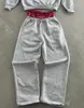 Sudadera con capucha de estilo callejero holgada retro americana transfronteriza Pantalones largos de doble cintura Pantalones de chándal a cuadros con retazos Estilo unisex moderno