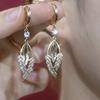 Aretes de Trigo Ojo de Gato de Temperamento y Alta Gama 2025 Nuevo Estilo Exquisitos Lujosos Moda Versátiles Aretes para Mujeres