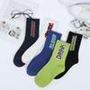 Calcetines de tubo transpirables con letras absorbentes de sudor para primavera y verano para mujer, calcetines de moda, fabricantes al por mayor