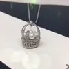 Cesta de Flores Pequeña Popular de Seiko Aurora Perla de Agua Dulce Natural Hebilla Universal Colgante Cadena de Clavícula Diamante Destellante Perla Venta al por Mayor