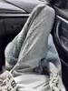 Jeans jacquard con degradado azul para hombre, pantalones de verano de estilo americano modernos de alta gama, pantalones de corte slim con microcampana orientados al diseño
