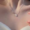 Colar feminino estilo coração ~ combinação de cores branca primavera e verão, colar avançado com laço leve e luxuoso, design de nicho, corrente para clavícula