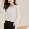 Toma real: Camisa de mujer de estilo francés de lujo ligero con bordado pesado, nueva para otoño, elegante, abotonada, bordada, cuello redondo, manga larga