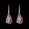 Nuevos pendientes de moda 2023, temperamento, alta calidad, oro rosa, pendientes de cristal para mujer, pendientes de gota de agua color champán, venta al por mayor