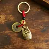 Llavero colgante de lingote de aleación de moda, accesorio de metal para hombres y mujeres, pequeño adorno decorativo, venta al por mayor