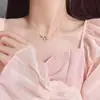 Collar de Alas de Ángel para Mujer Oro Rosa Lujo Ligero Diseño de Nicho Cadena para Clavícula Elegante Versátil Cadena para el Cuello Venta al por Mayor