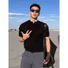 Camiseta Masculina Henley 2026 Novo Estilo Manga Curta Fitness Esportes Verão Estilo Americano Mostra Muscular Meia Manga Top Tendência