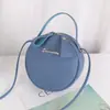 Bolsa Nueva de Primavera para Mujer Bolsa Redonda Pequeña Linda Bolso de Hombro Cruzado Bolso Portátil para Cosméticos Venta al por Mayor de Comercio Exterior Bolsa Pequeña