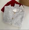 Cárdigan de punto con hebilla dorada de lana de Año Nuevo para mujer 23 otoño e invierno nuevo suéter raglán abrigo top suelto adelgazante