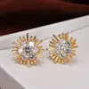 Europa y Estados Unidos populares Pendientes de cobre con diamantes de lujo girasol moda micro incrustación forma de flor larga fabricantes venta al por mayor