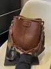 Bolsa Maillard de Luxo Feminina 2025 Nova Outono Textura Retrô Bolsa de Ombro Alça Larga Bolsa Transversal Saco