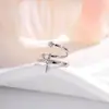 Ear Cuff Henson Minimalista Estilo Frio Estrela de Quatro Pontas Unissex, Acessório Exquisito Versátil de Nicho com Sensação de Luxo