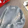 Marca de moda de calle estadounidense suéter de punto con cuello redondo desgarrado para hombre y mujer, cárdigan de otoño e invierno, chaqueta de punto casual versátil