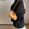 Bolso de hombro casual simple 2023 Nuevo bolso de invierno para mujer bolso tipo cubo con cadena romboidal moda estilo occidental bolso cruzado