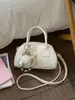 Bolso de Mano Pequeño Versátil Estilo Coreano Ins Transfronterizo para Mujer 2026 Nuevo Bolso Boston de Moda Bolso de Hombro Cruzado