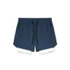 Pantalones cortos de running y fitness para hombre, talla europea, de nailon elástico en cuatro direcciones, corte ajustado, con forro interior, para deportes y actividades al aire libre