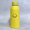 Nuevo vaso de agua con cara sonriente, carcasa exterior de plástico de doble capa de alta estética, vaso de cristal, regalo para evento de celebración de tienda promocional, venta al por mayor