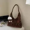 Bolso tote de gran capacidad con estampado de leopardo de moda, diseño de nicho coreano, bolso de hombro y axila elegante y a la moda para ir al trabajo