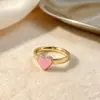 Estilo dulce y fresco, anillo de pareja de acero de titanio en forma de corazón de lujo ligero para mujer, anillo de acero inoxidable con goteo de aceite de diseño de nicho europeo y americano, joyería