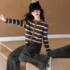 Conjunto de cárdigan a rayas para niña Otoño 2026 Nuevo estilo coreano Chic para niña Primavera y Otoño Suéter Pantalones de pierna recta Conjunto de dos piezas