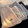 Fabricante original pantalones de gofre para hombre sueltos pierna ancha rectos deportivos casuales combinan con todo retro pantalones de punta hombre