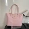 2026 Nueva Moda Popular Elegante Estilo Coreano Personalidad Ins Bolso Casual Bolso Tote de Hombro Axila Bolso Cruzado para Mujer
