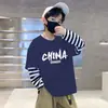 Algodão Puro Roupa de Outono 2026 Novo Estilo Menino Roupas Infantis Camiseta de Manga Longa para Meninos Estilo Primavera e Outono Camisa Básica Casual com Desenho