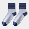 Calcetines de hombre hasta la pantorrilla con bloques de color para otoño e invierno, calcetines 10A antibacterianos y desodorantes, calcetines de hombre hasta la pantorrilla de Zhuji Socks Industry