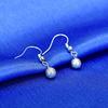 Qiao Lanxuan Europa y los Estados Unidos populares exquisitas joyas retro borla colgante arena luz cuentas pendientes al por mayor comercio exterior adornos de plata femenina