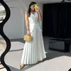 Transfronterizo en stock 2024 Traje europeo y americano Chaleco sin mangas de verano para mujer Falda elegante plisada Dos piezas para mujer