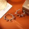 Brincos Grandes Assimétricos Ondulados Vazados Estilo Europeu e Americano Moda de Alto Padrão Brincos Exagerados Brincos de Design de Nicho
