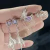 Pendientes de Personalidad Estilo Coreano Nuevo 2026 Pendientes de Cola de Pez Irregulares de Alta Gama Accesorios para Orejas de Pescado Simples de Moda Nicho