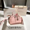 Una generación de bolsa de mezclilla rosa de nicho con platino, bolsa de lona platino de alta calidad para primavera y verano 2025, venta al por mayor