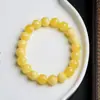 Pulseira de flor flutuante fluorescente de segunda geração, cor amarelo óleo de galinha, cera de abelha, pulseira de âmbar de água salgada, presente de atividade para homens e mulheres