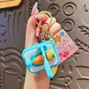 Llavero Creativo Nueva Máquina Cortadora de Zanahorias Lindo Dibujo Animado Juguete de Descompresión Colgante para Mochila Escolar de Estudiante Pequeño Regalo