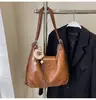 Bolso tote de un solo hombro para mujer, nuevo estilo 2026, gran capacidad, diseño de mochila para el trabajo, ligero, mochila de viaje a la moda