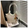 Bolsa Saco Casual Moda Retrô Feminina 2026 Primavera Novo Estilo Popular Passeio Trabalho Texturizada Ombro Mão