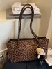 Bolsa de Ombro Leopard Print Super Popular Outono e Inverno Transfronteiriça para Mulheres 2026 Nova Moda Nicho High-End Retro Bolsa de Ombro para o Dia a Dia
