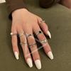 Nuevo anillo de cadena de moda europea y americana para mujer, estilo retro, apertura sencilla, joyería para parejas de estudiantes, joyería creativa con pegamento en forma de gota.
