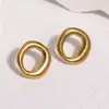 Pendientes geométricos minimalistas de acero inoxidable de moda transfronterizos, diseño circular simple, pendientes únicos y exquisitos de acero de titanio para mujer