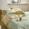 Juego de ropa de cama de algodón 100% de grado A para maternidad e infantil, juego de cuatro piezas de algodón puro con un diseño de dos tonos simple y de alta gama, que incluye funda de edredón, sábana plana y sábana bajera
