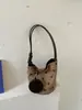 Bolso de mano único de lunares para mujer, bolso tote pequeño exquisito y súper popular, nuevo bolso de hombro versátil de moda 2026, bolso tipo cubo personalizado
