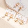 Aretes de acero de titanio de tendencia europea y americana con ojos de luna de flor, multiestilo, personalidad nicho femenina, aretes de acero inoxidable para mujer